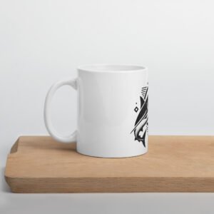 A minimalist, tattoo-style shortfin mako shark, depicted in motion with clean, flowing lines. The design embodies the speed and elegance of this North Atlantic predator, tying it to the coastal waters of the British Isles.